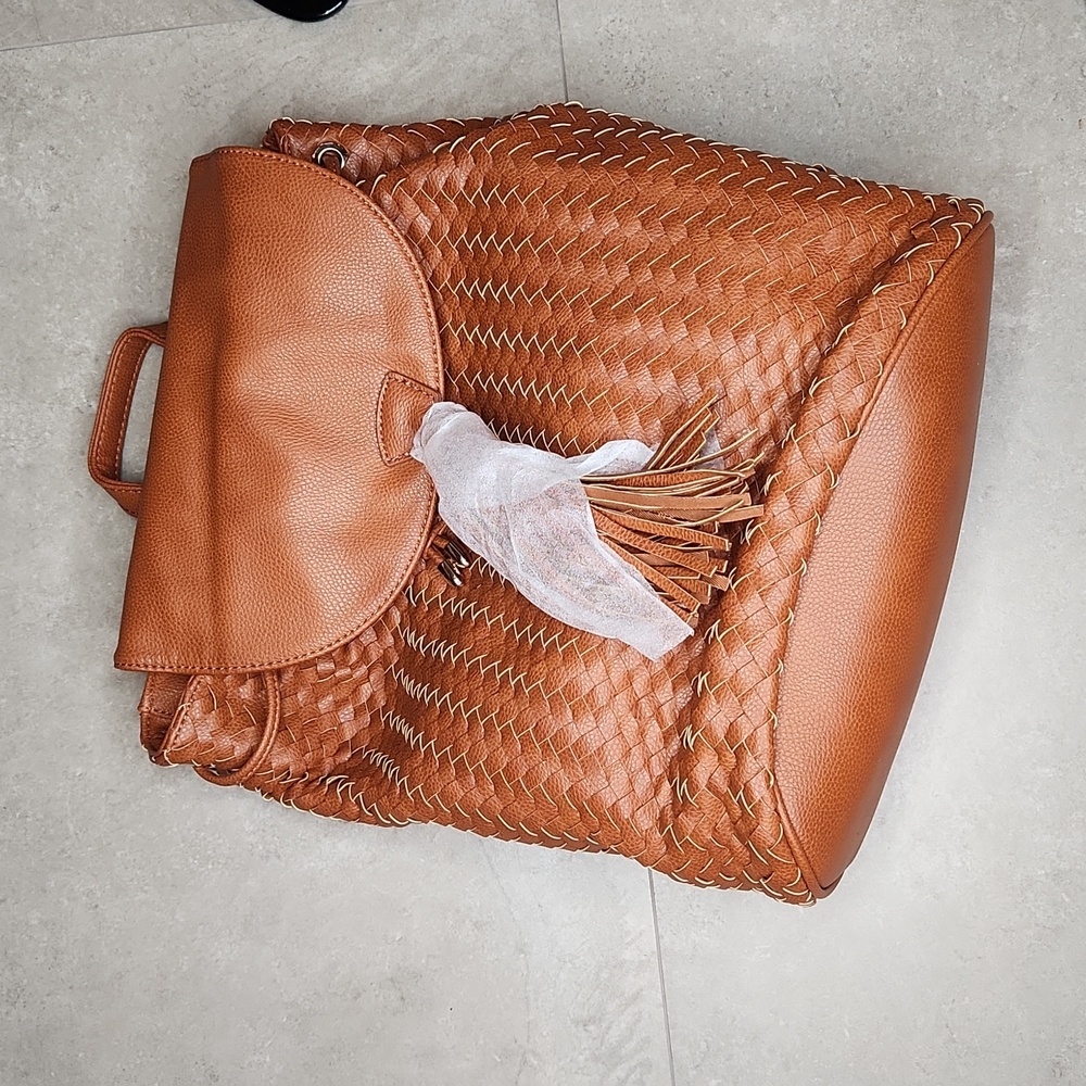 Medium Sized Vegan Leather Weaved Backpack never used still in packaging
